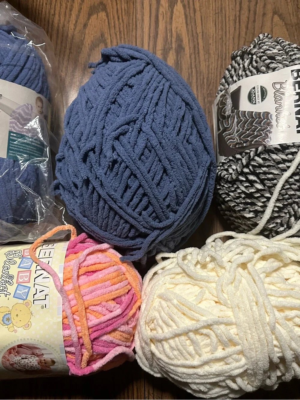 Bernat and Assorted Plush Yarn Bundle - Blue, Cream, Pink/Orange, Black/White - Picture 1 of 2